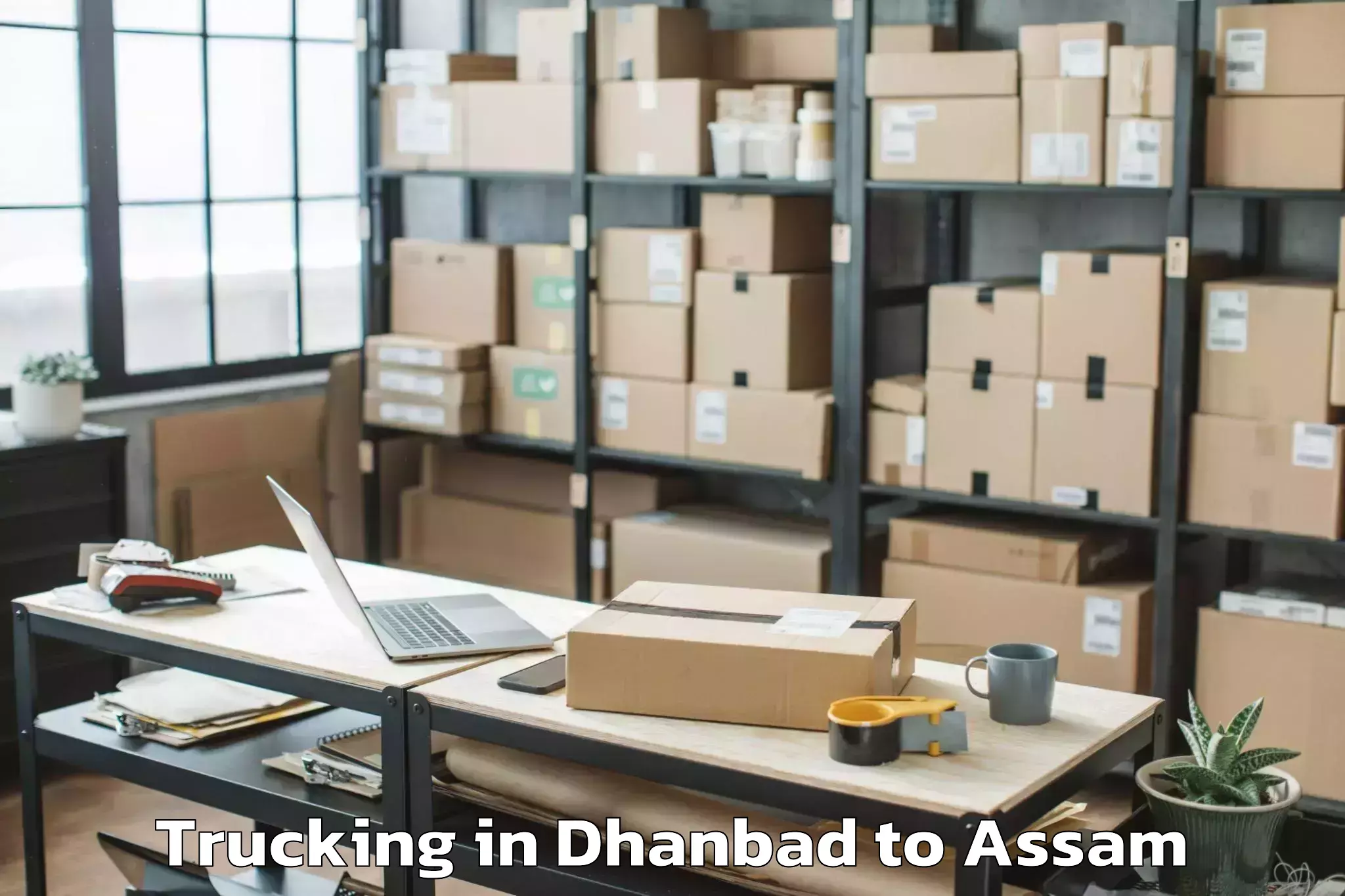 Easy Dhanbad to Guwahati University Trucking Booking